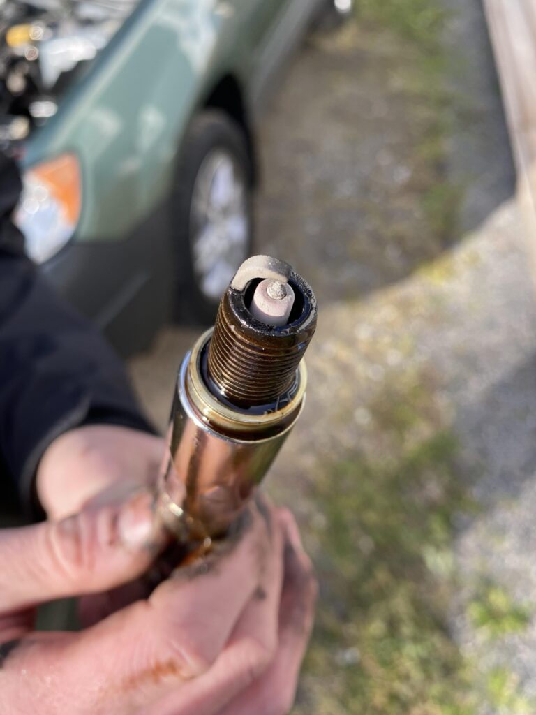 Why is There Coolant in My Spark Plugs